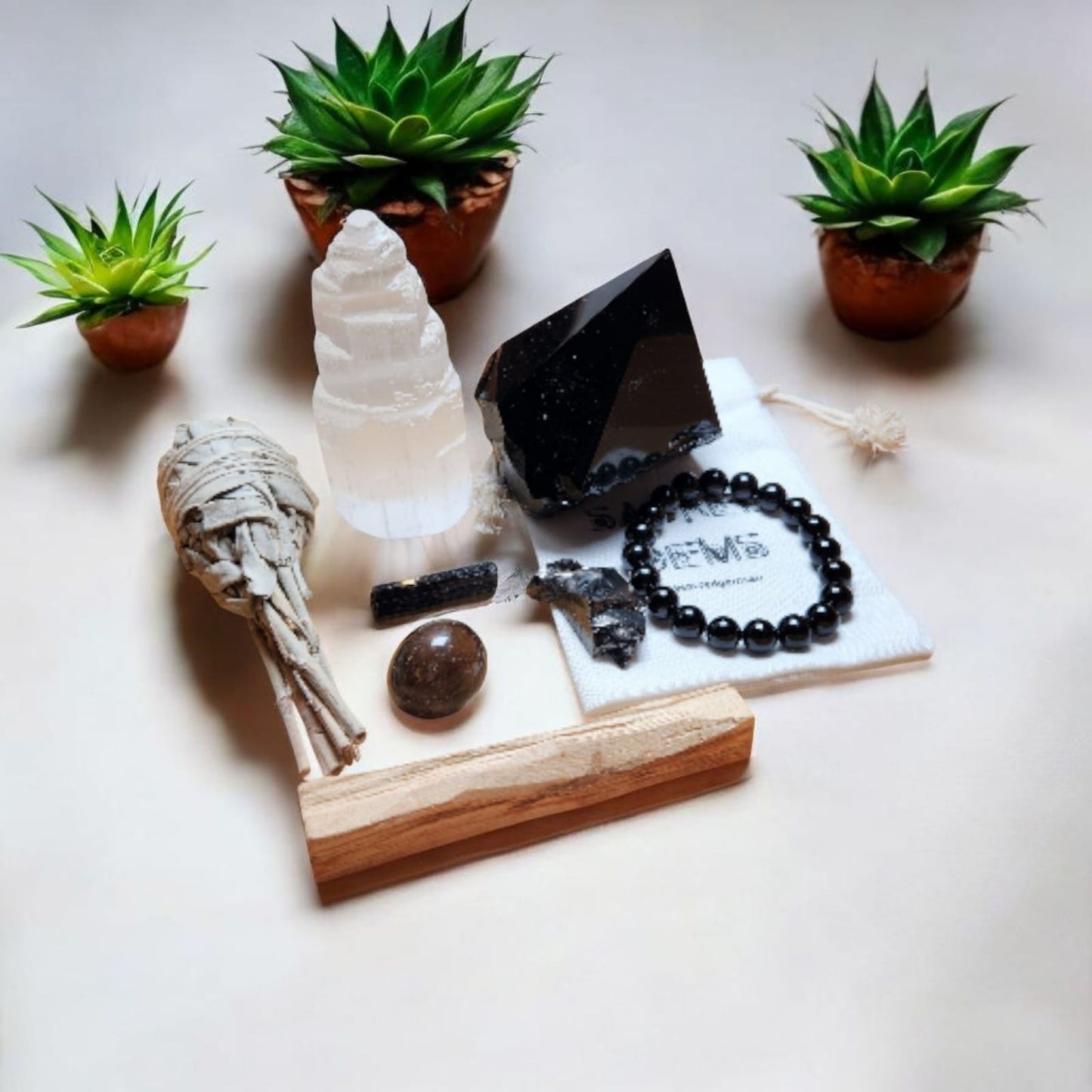 Sacred Gems – Protection Crystal Kit – Deluxe Edition full contents flat lay with Black Tourmaline bracelet and Elite Shungite [variant:deluxe]
