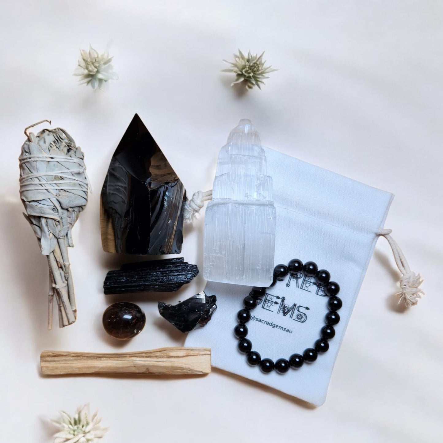 Sacred Gems – Protection Crystal Kit – Deluxe Edition full contents flat lay with Black Tourmaline bracelet and Elite Shungite [variant:deluxe]
