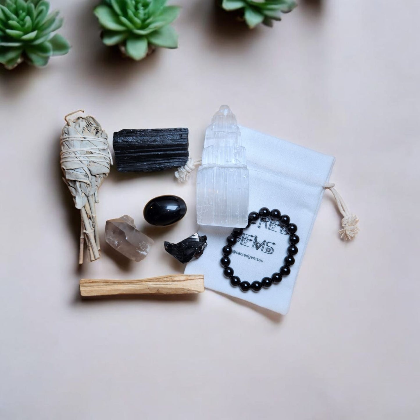 Sacred Gems – Protection Crystal Kit – Deluxe Edition full contents flat lay with Black Tourmaline bracelet and Elite Shungite [variant:deluxe]
