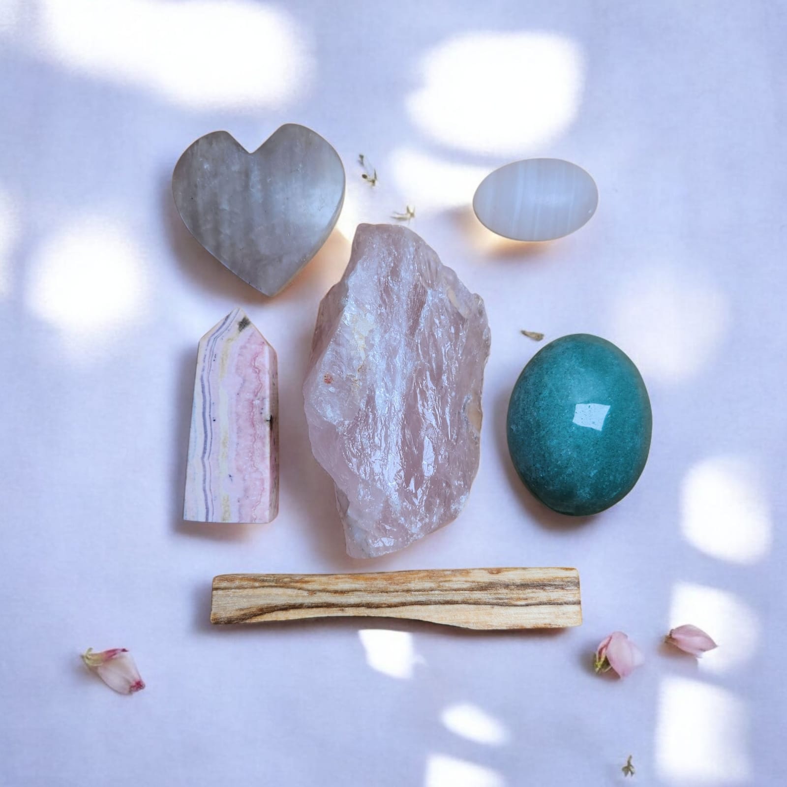 Sacred Gems – Love Crystal Kit – Standard Edition crystals (Rose Quartz,Mangano Calcite, Rhodonite, Green Aventurine, Moonstone) arranged on soft blush fabric [variant:standard]
