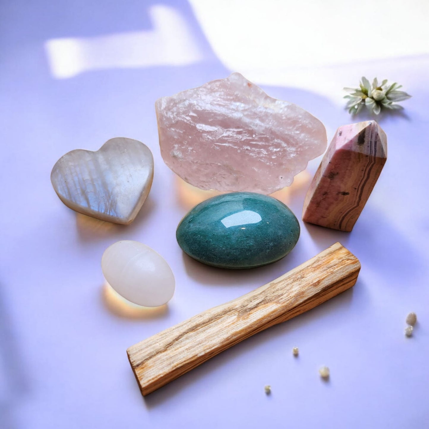 Sacred Gems – Love Crystal Kit – Standard Edition crystals (Rose Quartz,Mangano Calcite, Rhodonite, Green Aventurine, Moonstone) arranged on soft blush fabric [variant:standard]
