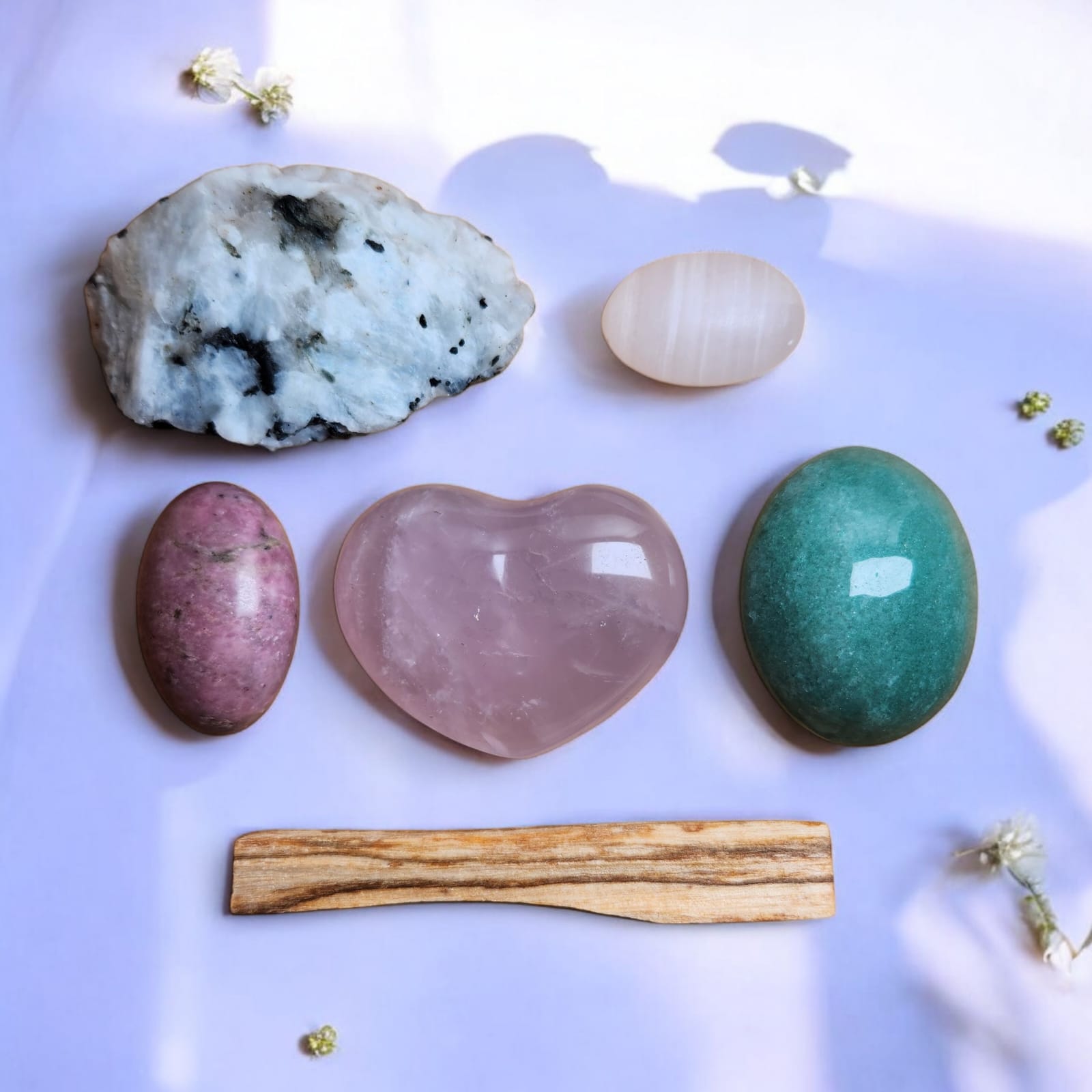 Sacred Gems – Love Crystal Kit – Standard Edition crystals (Rose Quartz,Mangano Calcite, Rhodonite, Green Aventurine, Moonstone) arranged on soft blush fabric [variant:standard]
