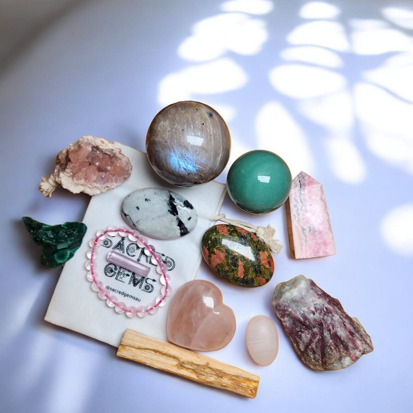 Sacred Gems – Love Crystal Kit – Deluxe Edition full contents flat lay including Kunzite and Rose Quartz bracelet [variant:super deluxe]
