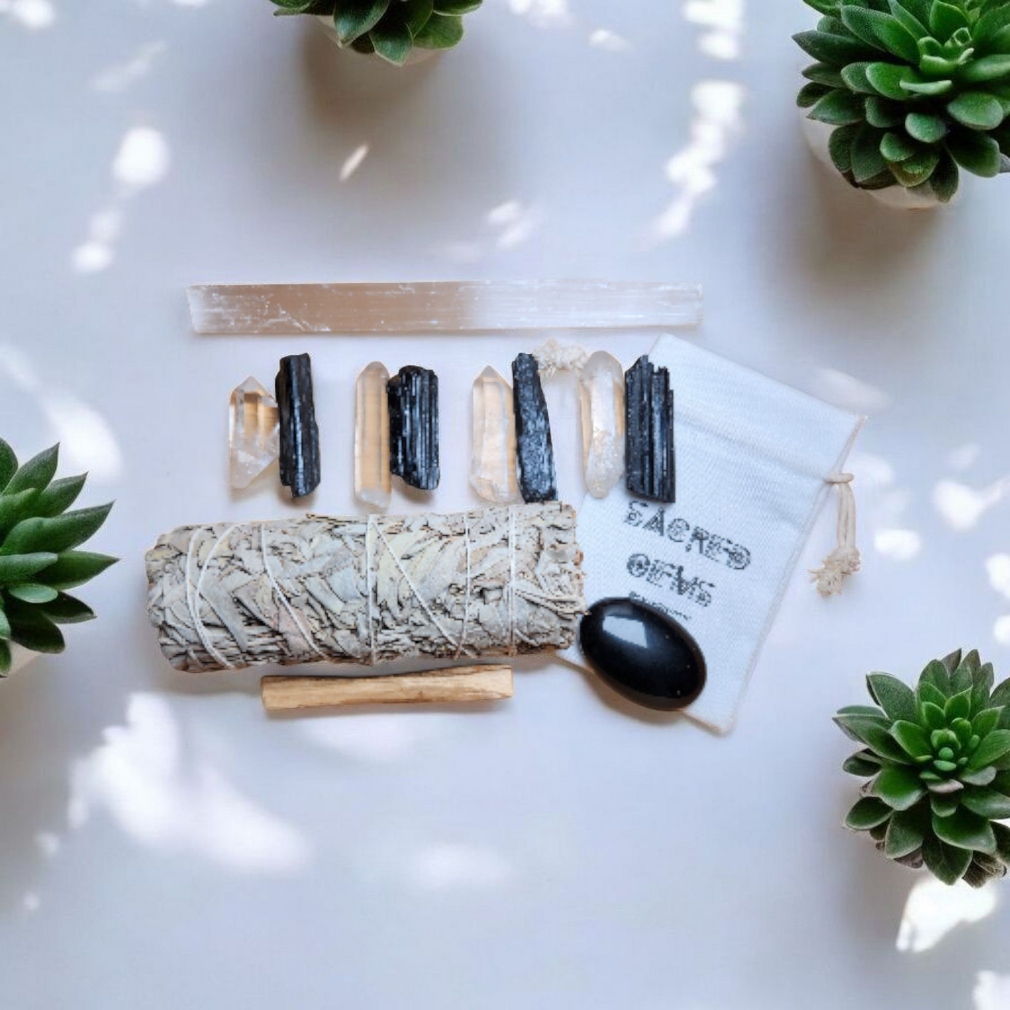 Sacred Gems – Home Protection Crystal Grid Kit – Deluxe edition with obsidian, labradorite, larger tourmaline, white sage torch, linen bag [variant:deluxe]